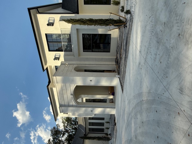 Exterior painting and stucco repair on Hutchinson Island Florida