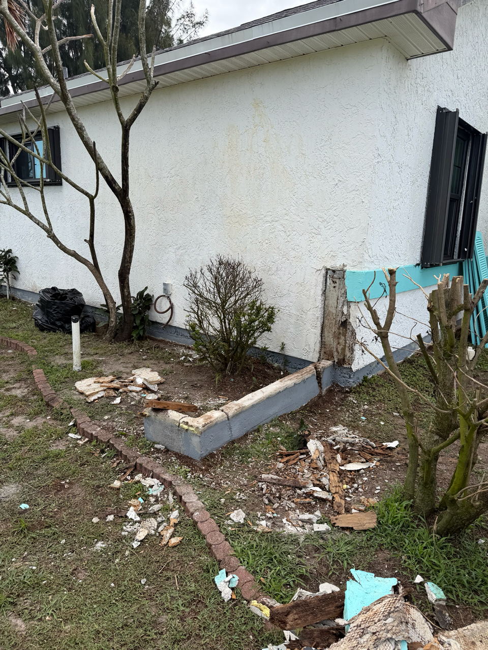 Water damage wall repair and stucco restoration near Tradition Florida